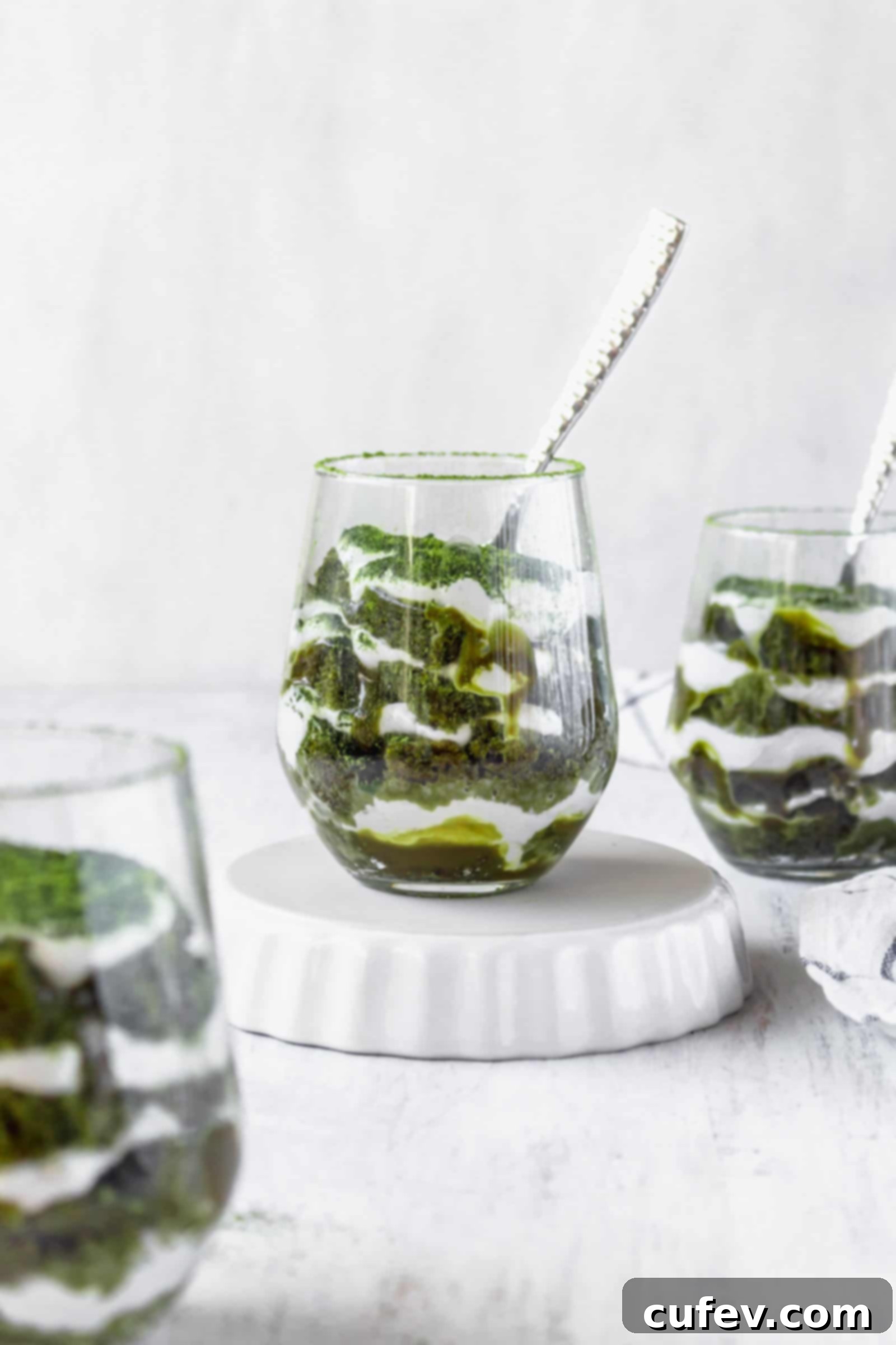 Vegan matcha tiramisu is a Japanese twist on a classic Italian dessert! This recipe has layers of matcha cake, matcha sauce, and coconut whipped cream! #matchadessert #vegantiramisu #matchatiramisu #vegandessert #coconutwhippedcream