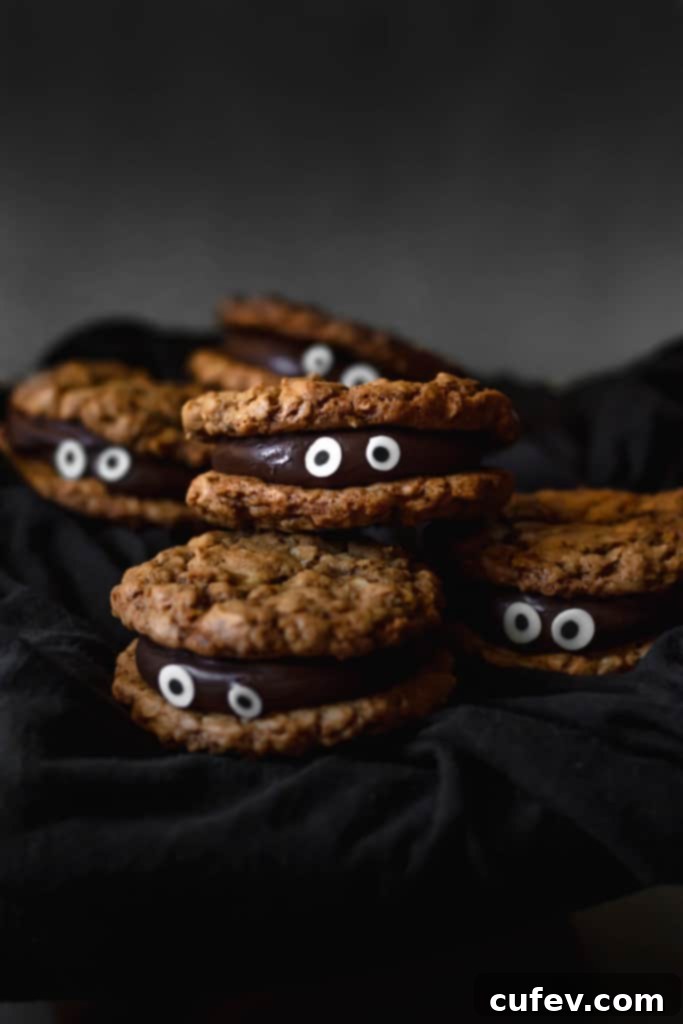 Chocolate fudge sandwiched between two oatmeal cookies make for a delicious and spooky treat!