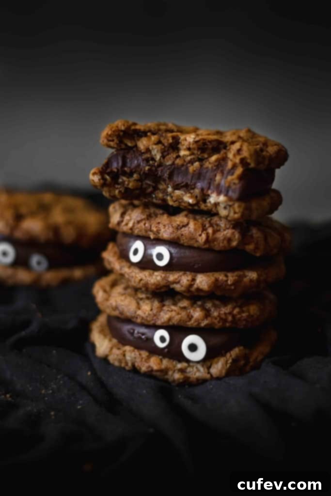 Chocolate fudge sandwiched between two oatmeal cookies make for a delicious and spooky treat!