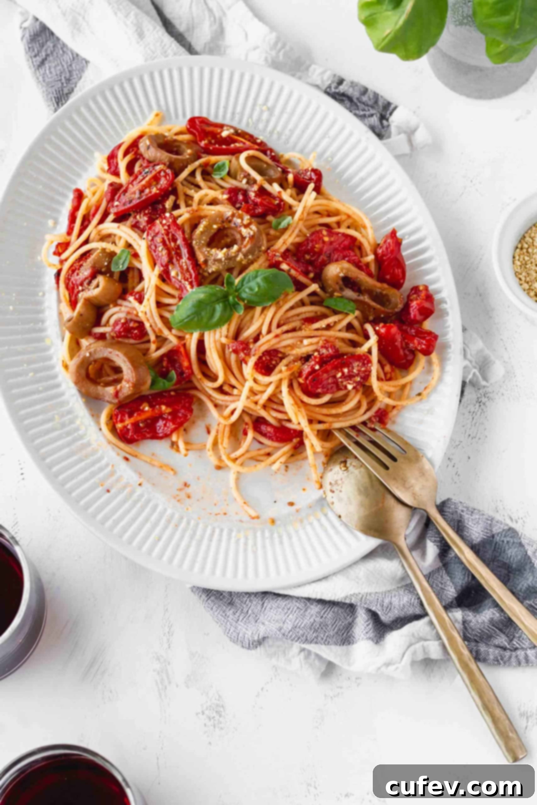 Vegan Calamari and Burst Tomato Pasta 3 A plate of spaghetti with cherry tomato sauce