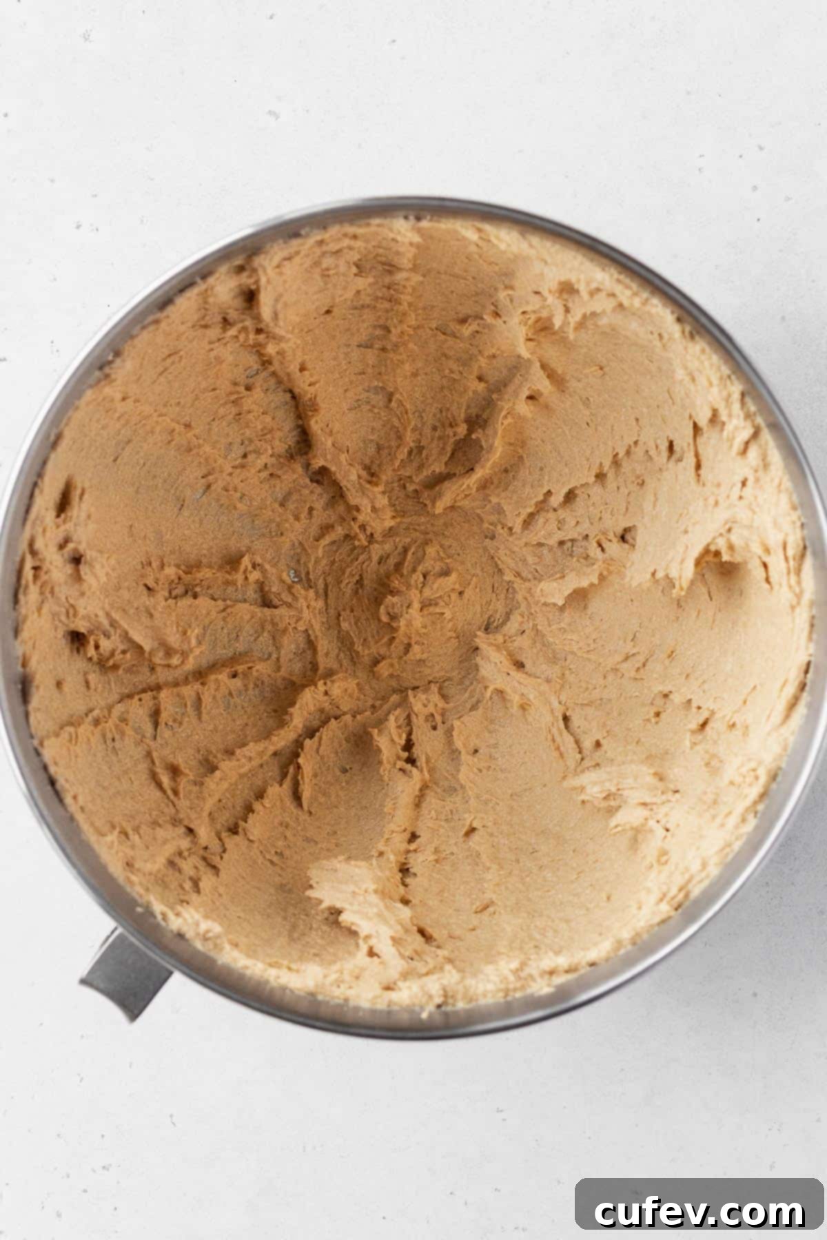 Creamed butter and sugar mixture in a large bowl, light and fluffy.