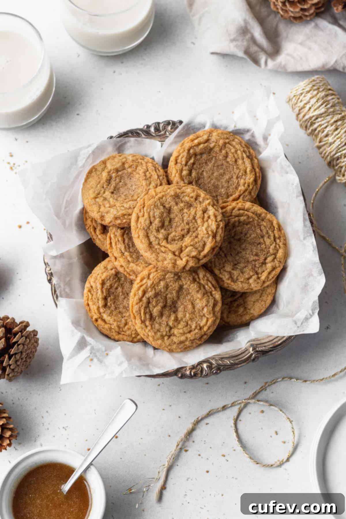Perfectly Chewy Gluten-Free Ginger Cookies 4 Gluten free ginger cookies on a platter.