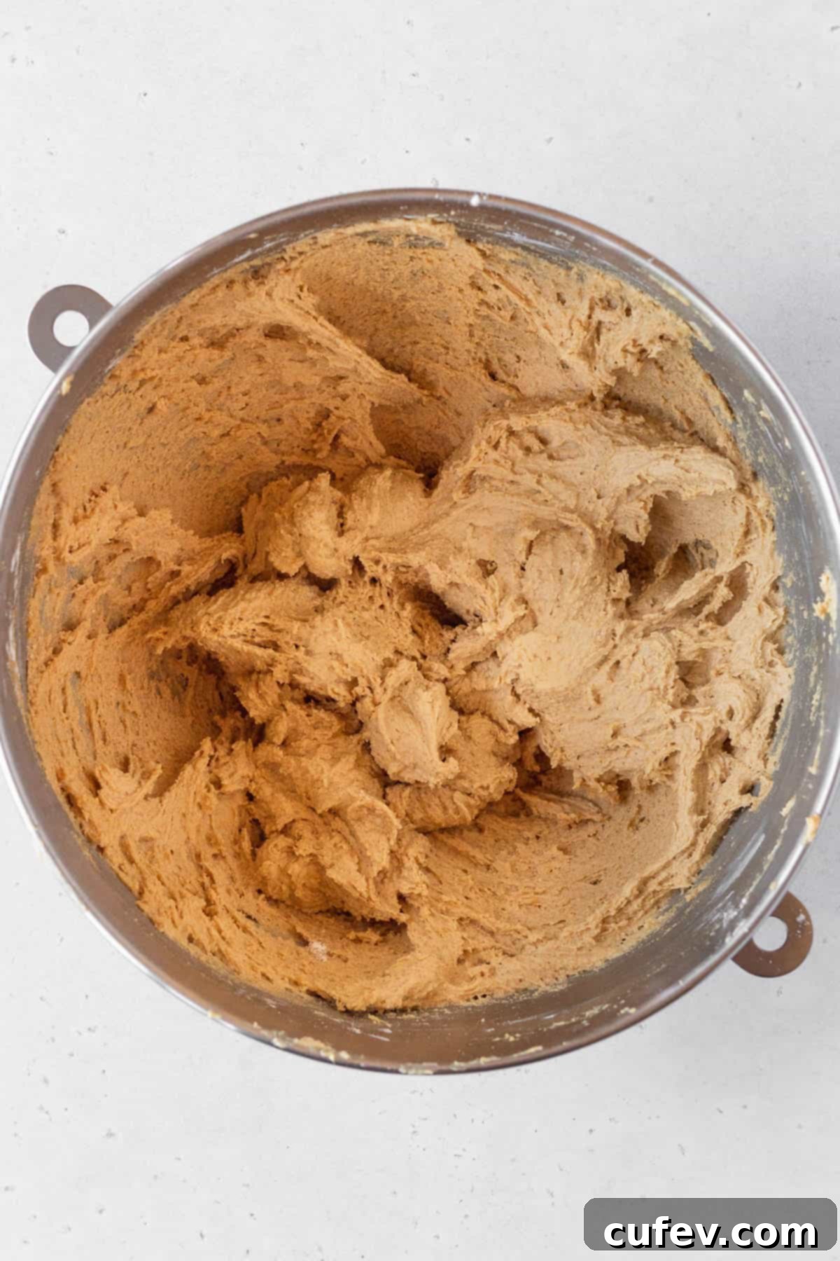 Perfectly Chewy Gluten-Free Ginger Cookies 10 Ginger cookie dough in a metal bowl.