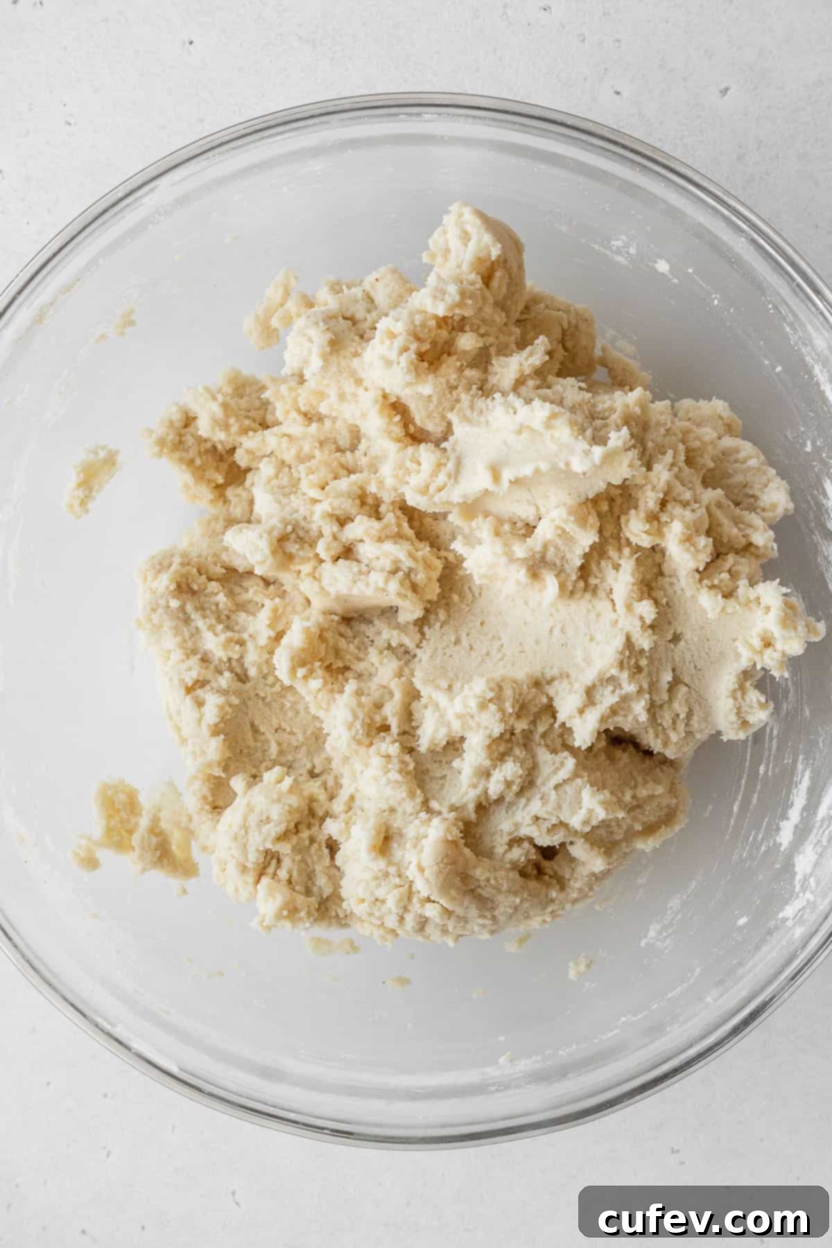 Cookie dough in a glass bowl.