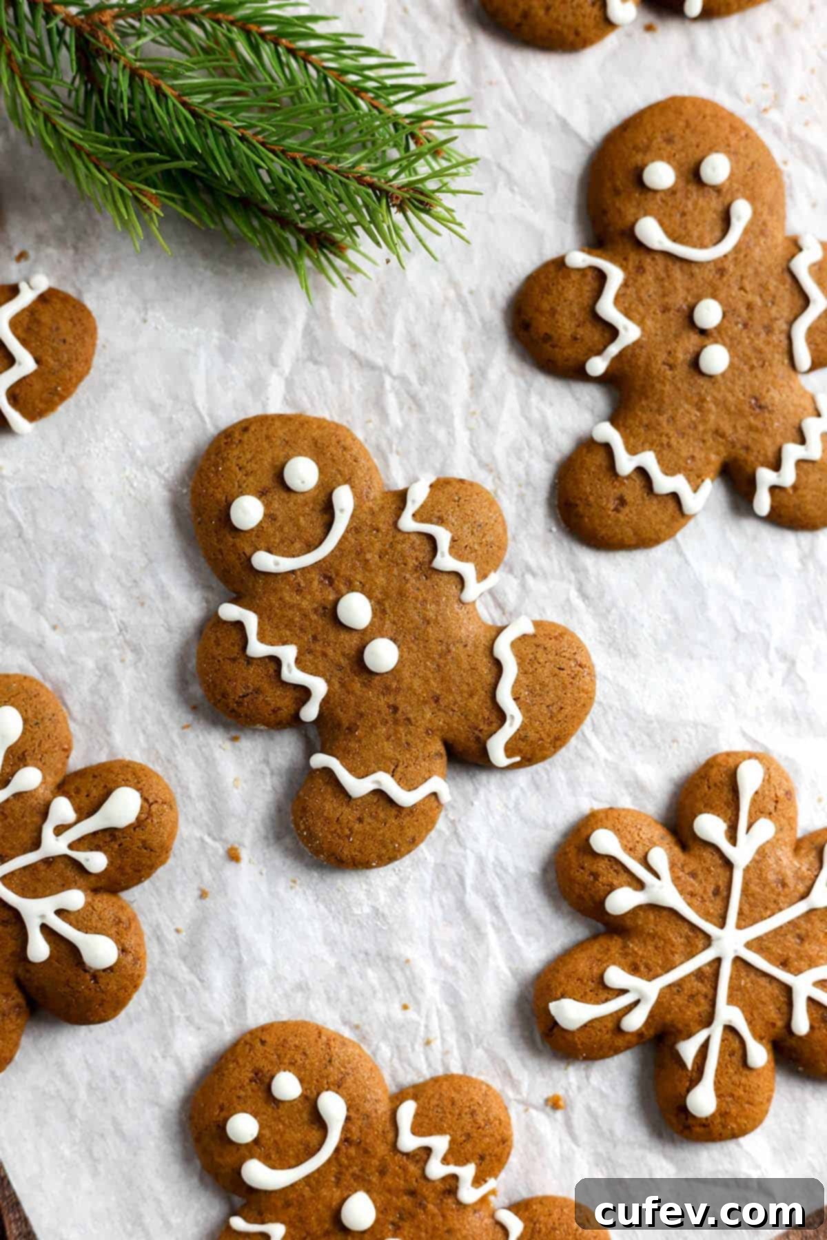 Gingerbread cookies decorated with white icing.