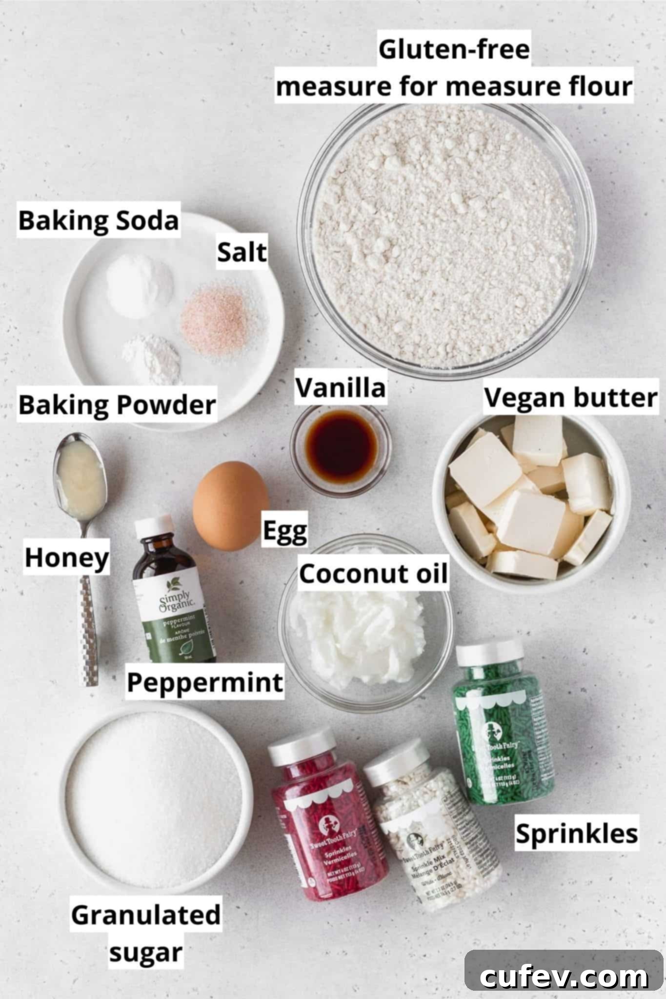 Ingredients to make gluten-free Christmas cookies measured out into bowls.