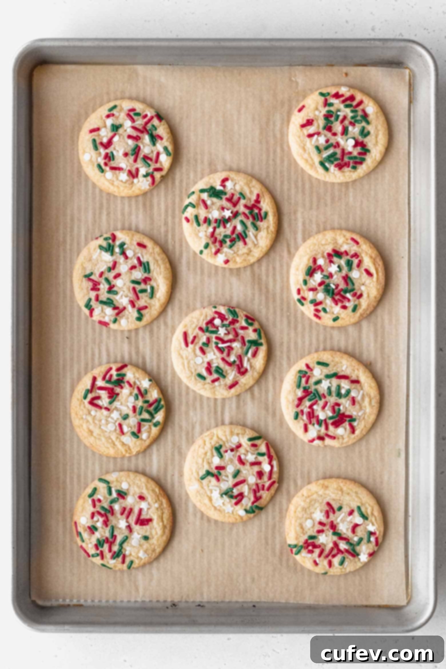 Baked Christmas cookies on a baking sheet.