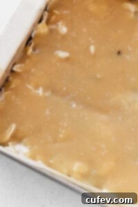 Flaky salt sprinkled over vegan sweetened condensed milk.